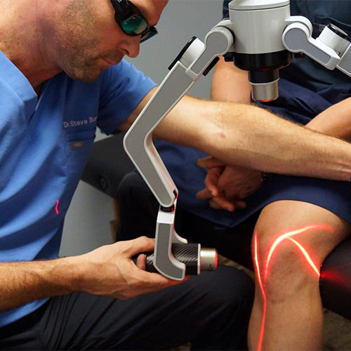 Chronic Pain in Schaumburg IL Steve Burlison Examining Leg Chronic Pain in Schaumburg IL Steve Burlison Examining Leg